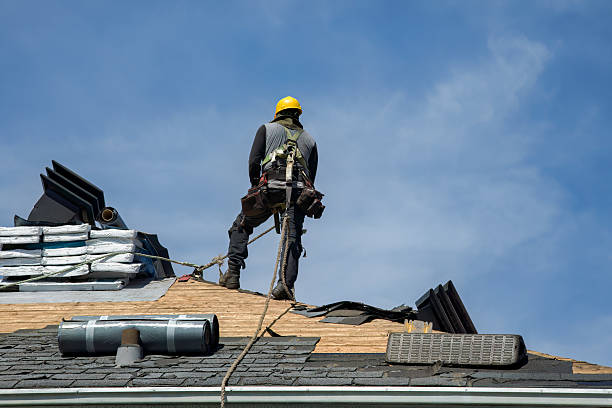 Professional Gutter Installation technician working in Aurora, NY